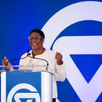 La June Montgomery Tabron speaking at podium